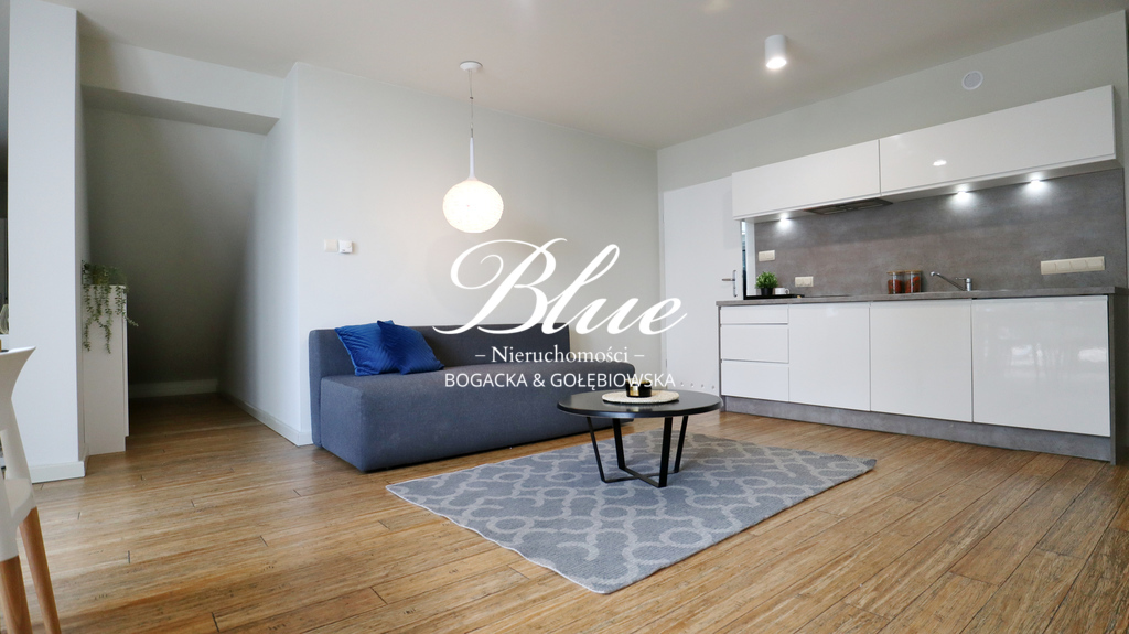 Apartament z dużym tarasem z widokiem na zieleń