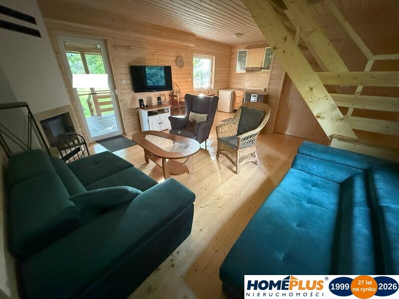 Drewniany dom letniskowy w Arciechowie, 70 m²