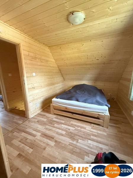 Drewniany dom letniskowy w Arciechowie, 70 m²