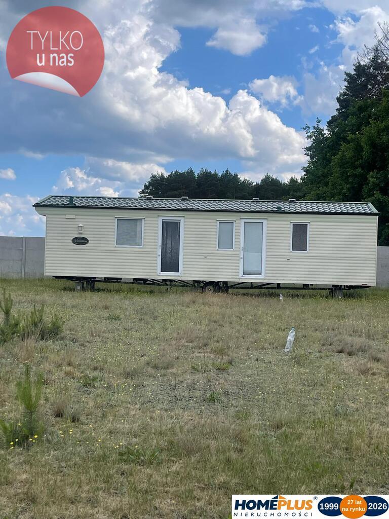 Działka budowlana 1200 m² z domkiem mobilnym.