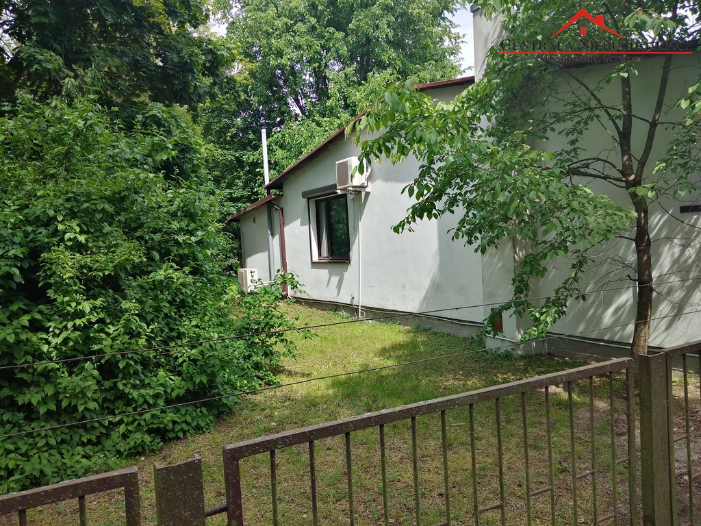 Duża działka z domem całorocznym